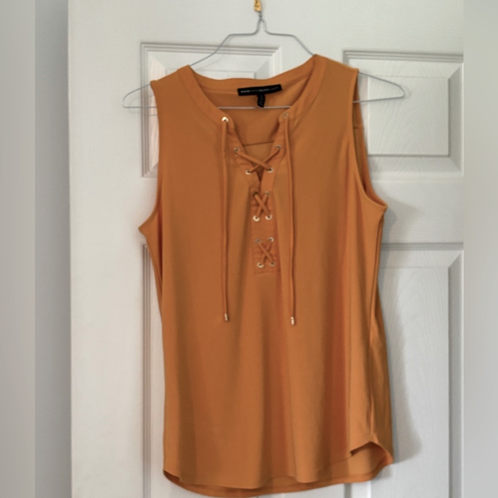 WHBM sleeveless tie neck top.   Med gold/orange.